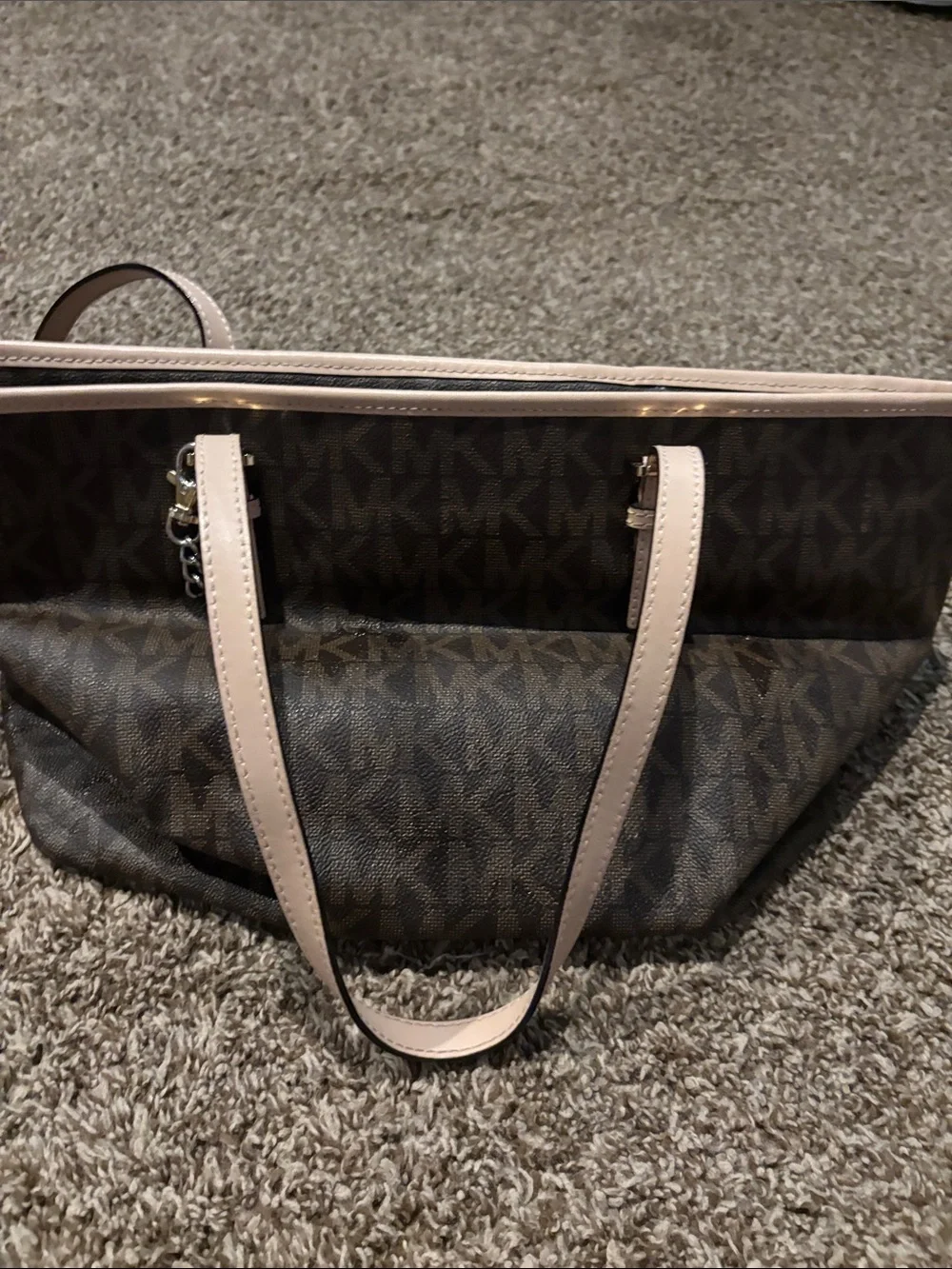 Michael Kors Brown Tote with tan trim does have some spots on inside